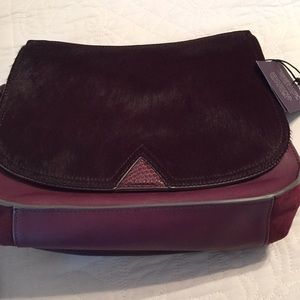 B Brian Atwood suede saddle bag in dark red